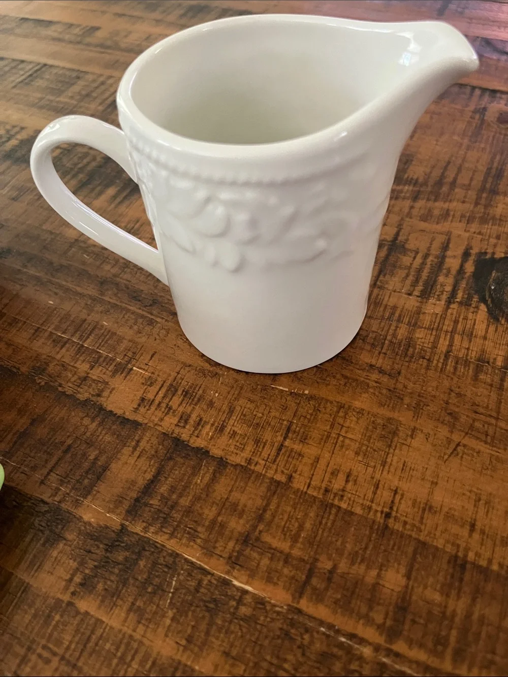 Classic White Ceramic Creamer with Embossed Detail